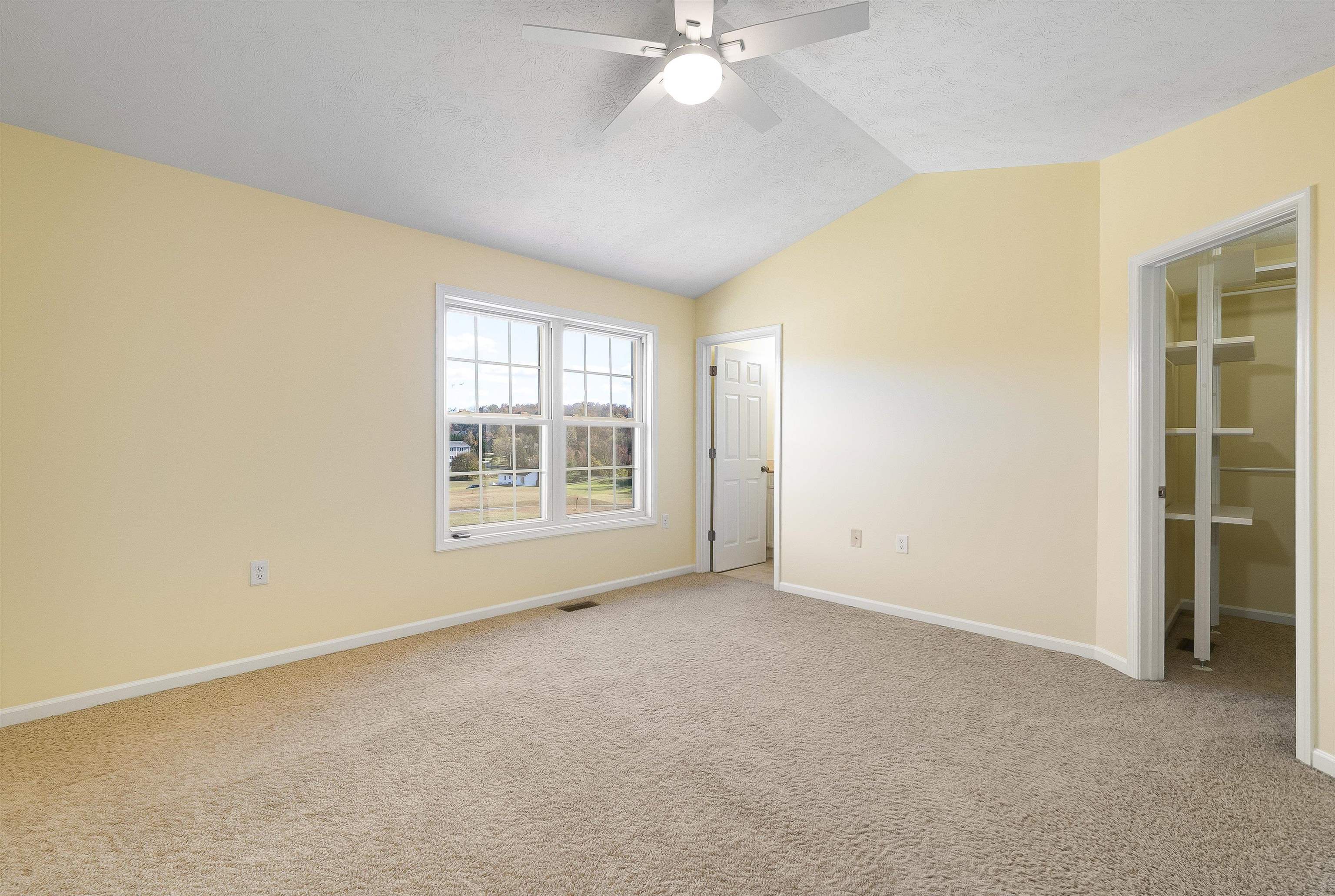 1439 Flowing Spring Lane Harrisonburg, VA 22801 - Photo 22 of 44 an empty room with windows and fan