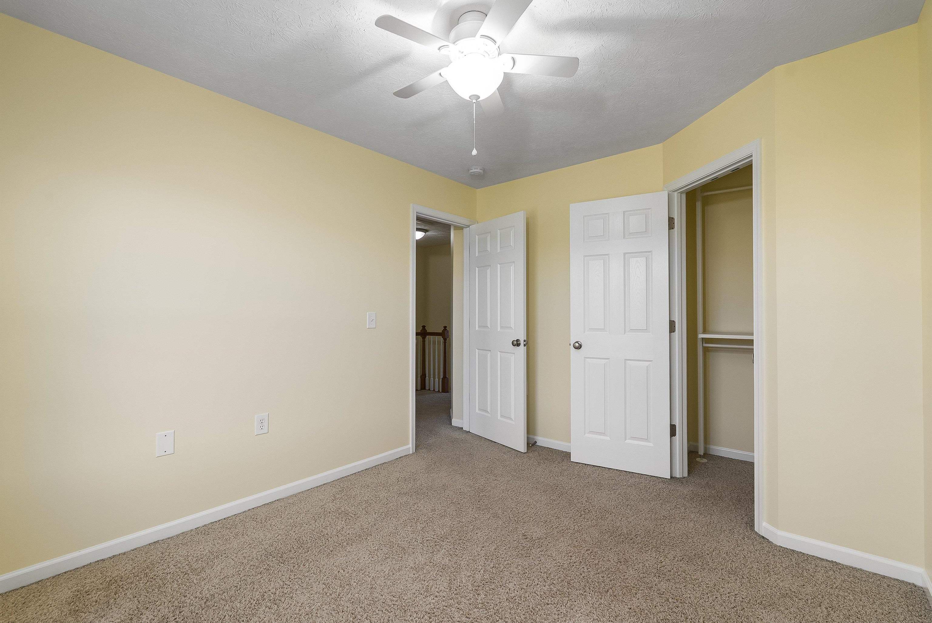 1439 Flowing Spring Lane Harrisonburg, VA 22801 - Photo 28 of 44 a view of an empty room and chandelier fan