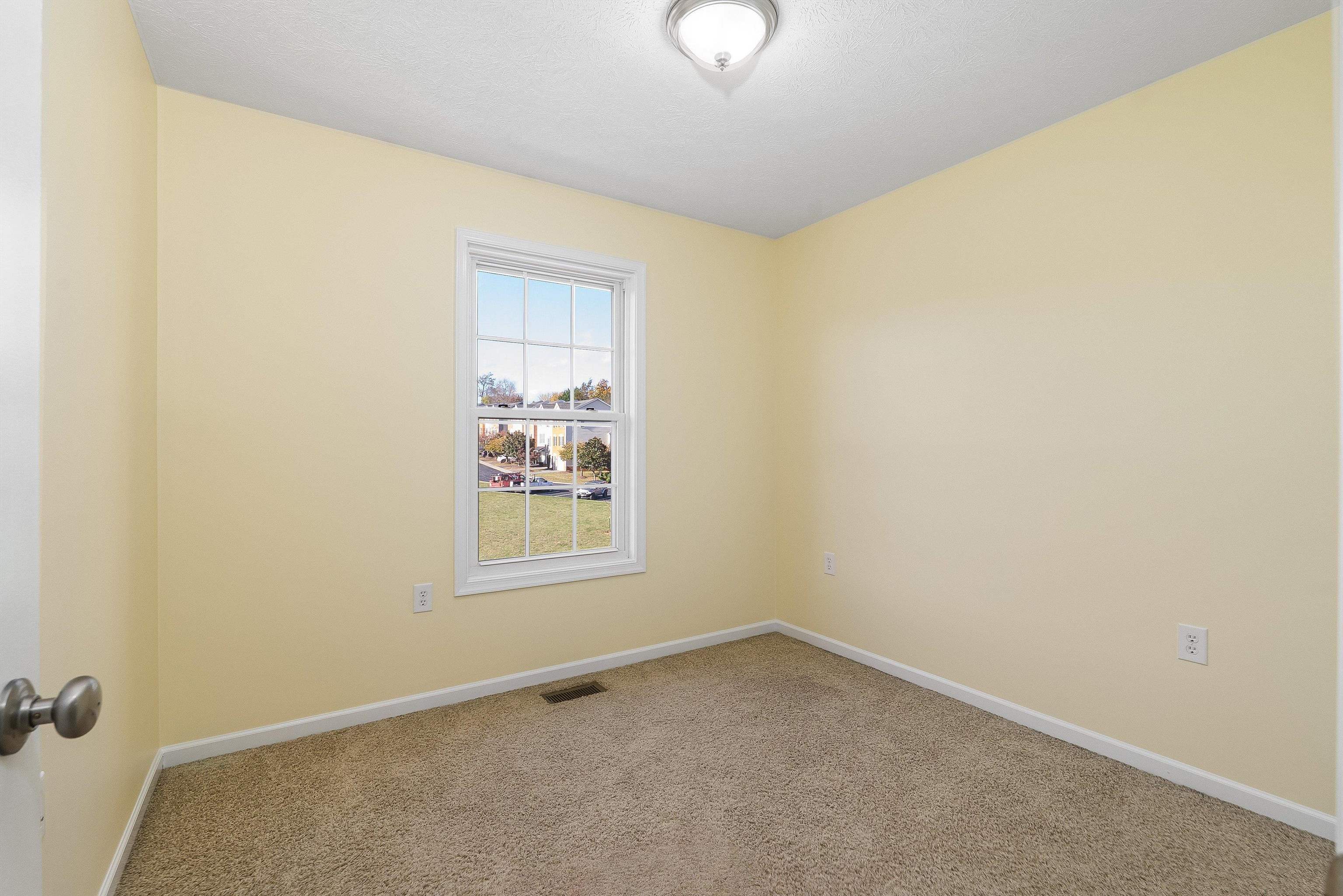1439 Flowing Spring Lane Harrisonburg, VA 22801 - Photo 29 of 44 an empty room with a window