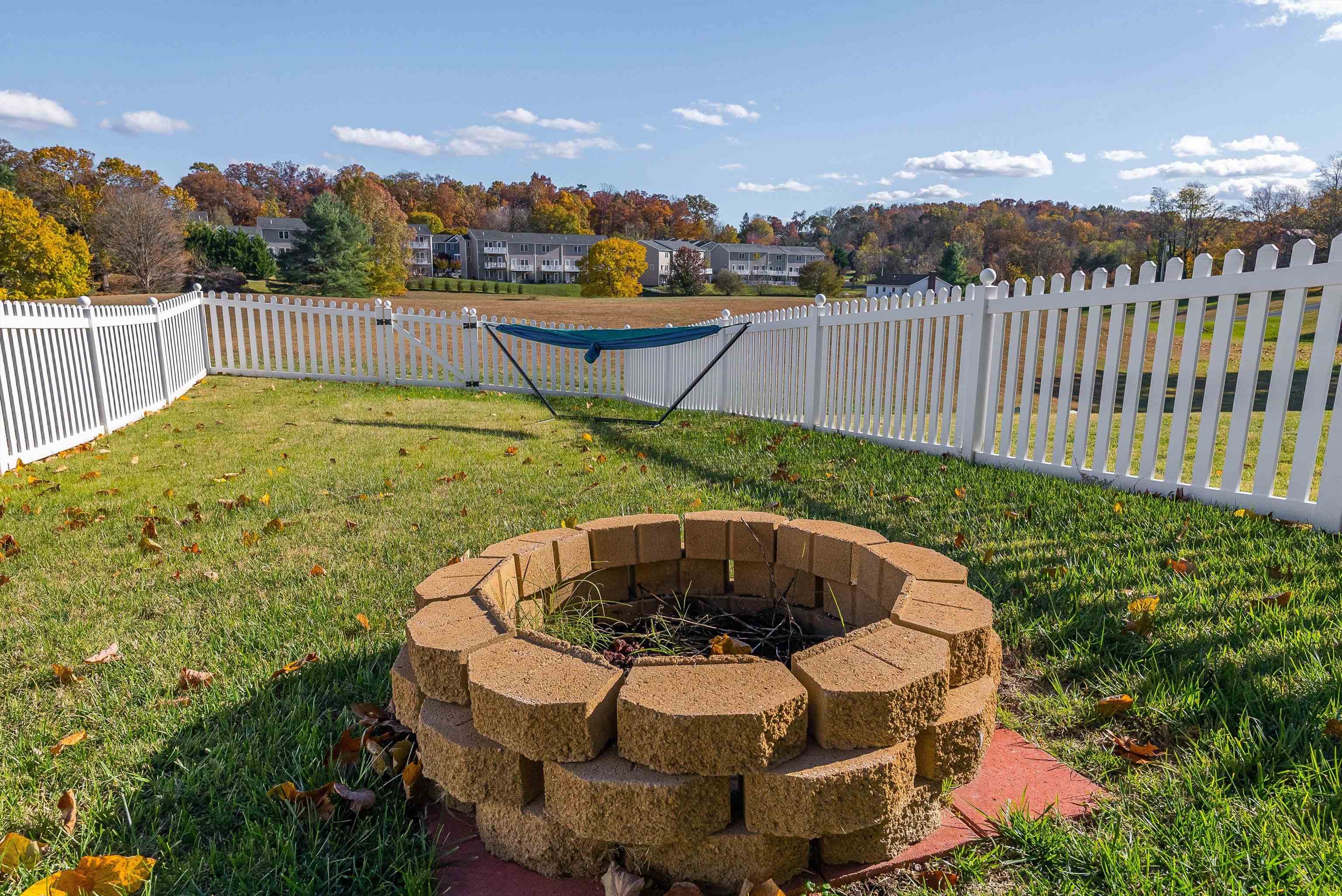 1439 Flowing Spring Lane Harrisonburg, VA 22801 - Photo 35 of 44 a view of a swimming pool with a yard and wooden fence