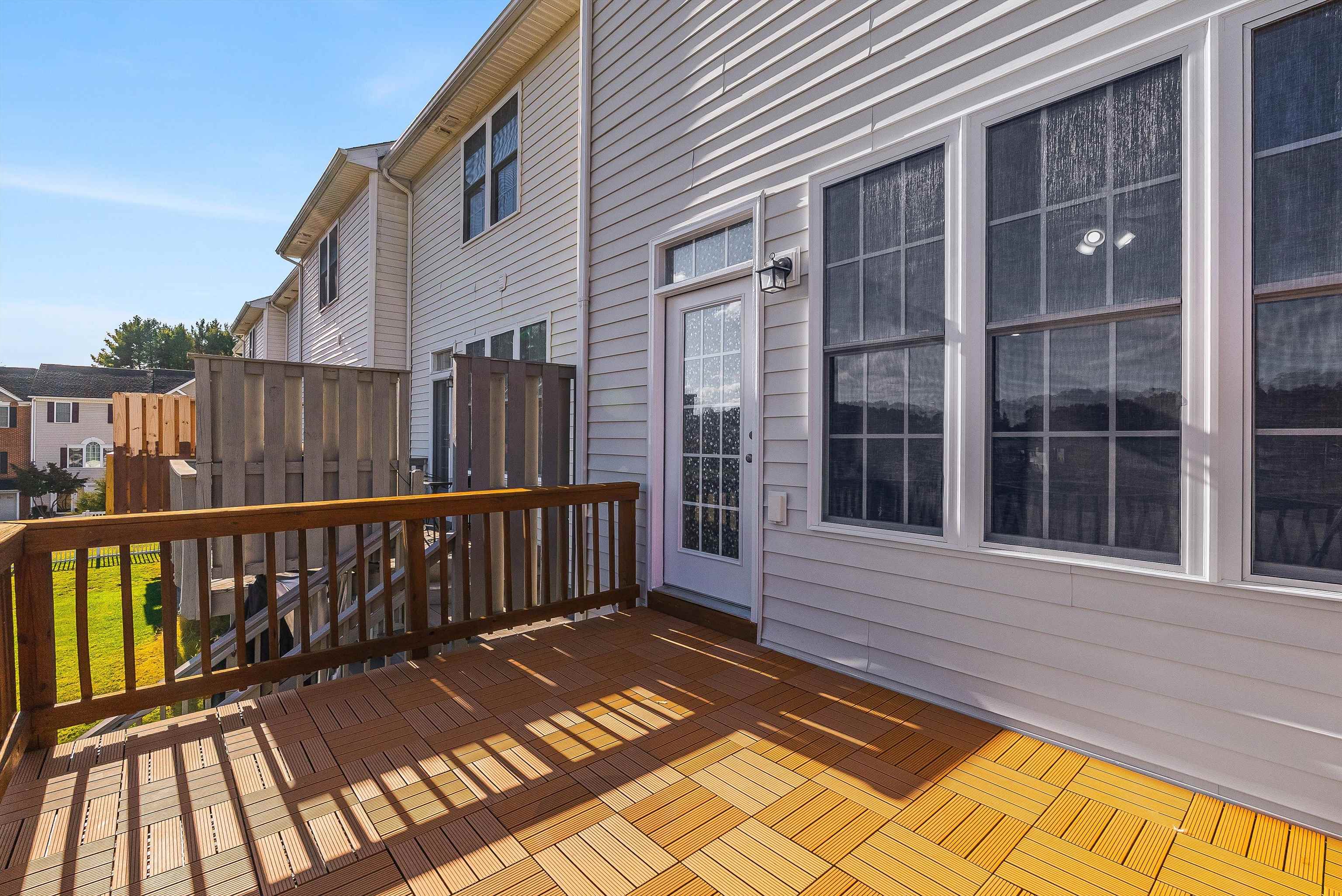 1439 Flowing Spring Lane Harrisonburg, VA 22801 - Photo 39 of 44 a view of a wooden balcony with a bench
