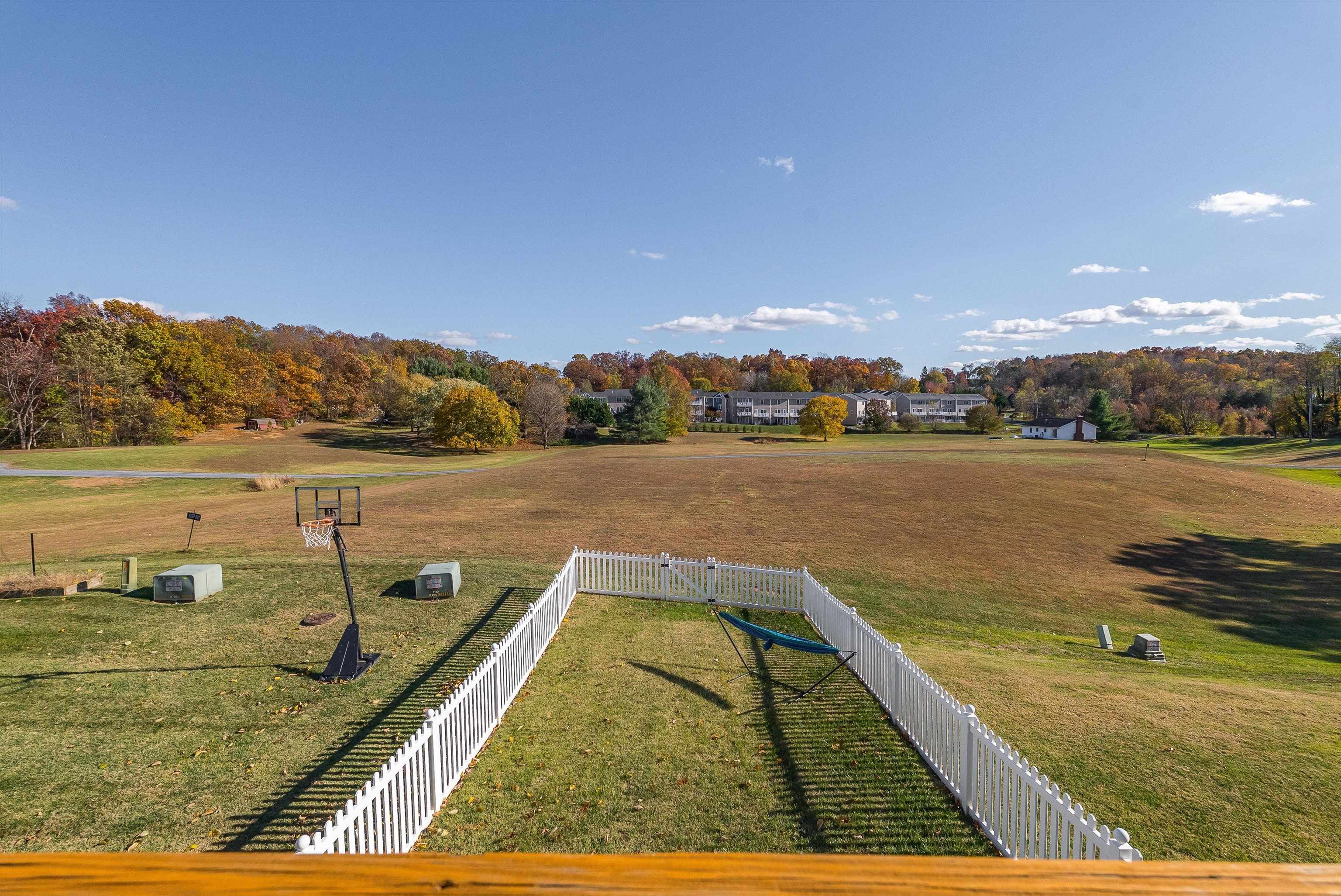 1439 Flowing Spring Lane Harrisonburg, VA 22801 - Photo 40 of 44 a view of swimming pool with lake and mountain in the back