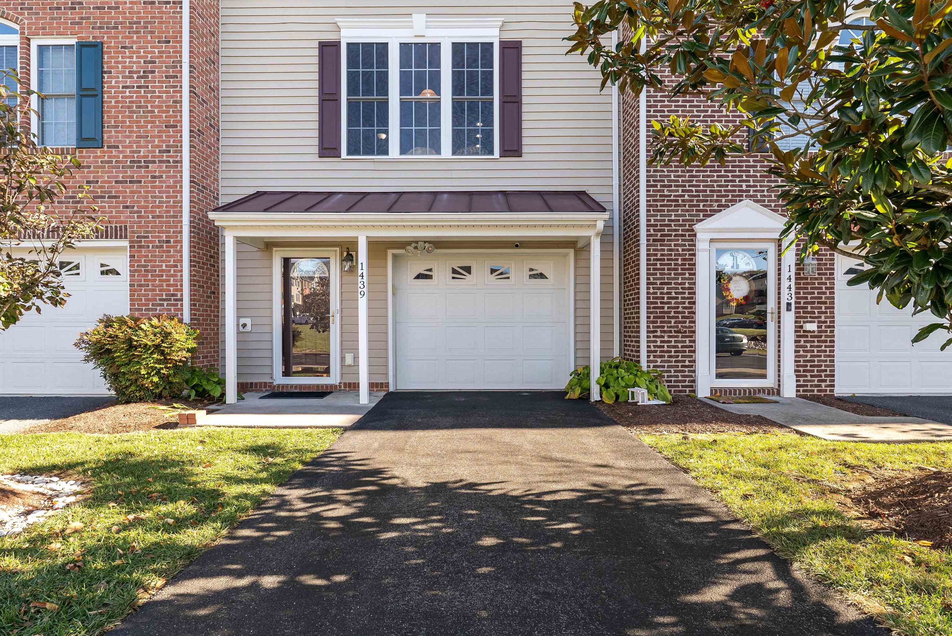 1439 Flowing Spring Lane Harrisonburg, VA 22801 - Photo 4 of 44 a view of a house with yard and garage