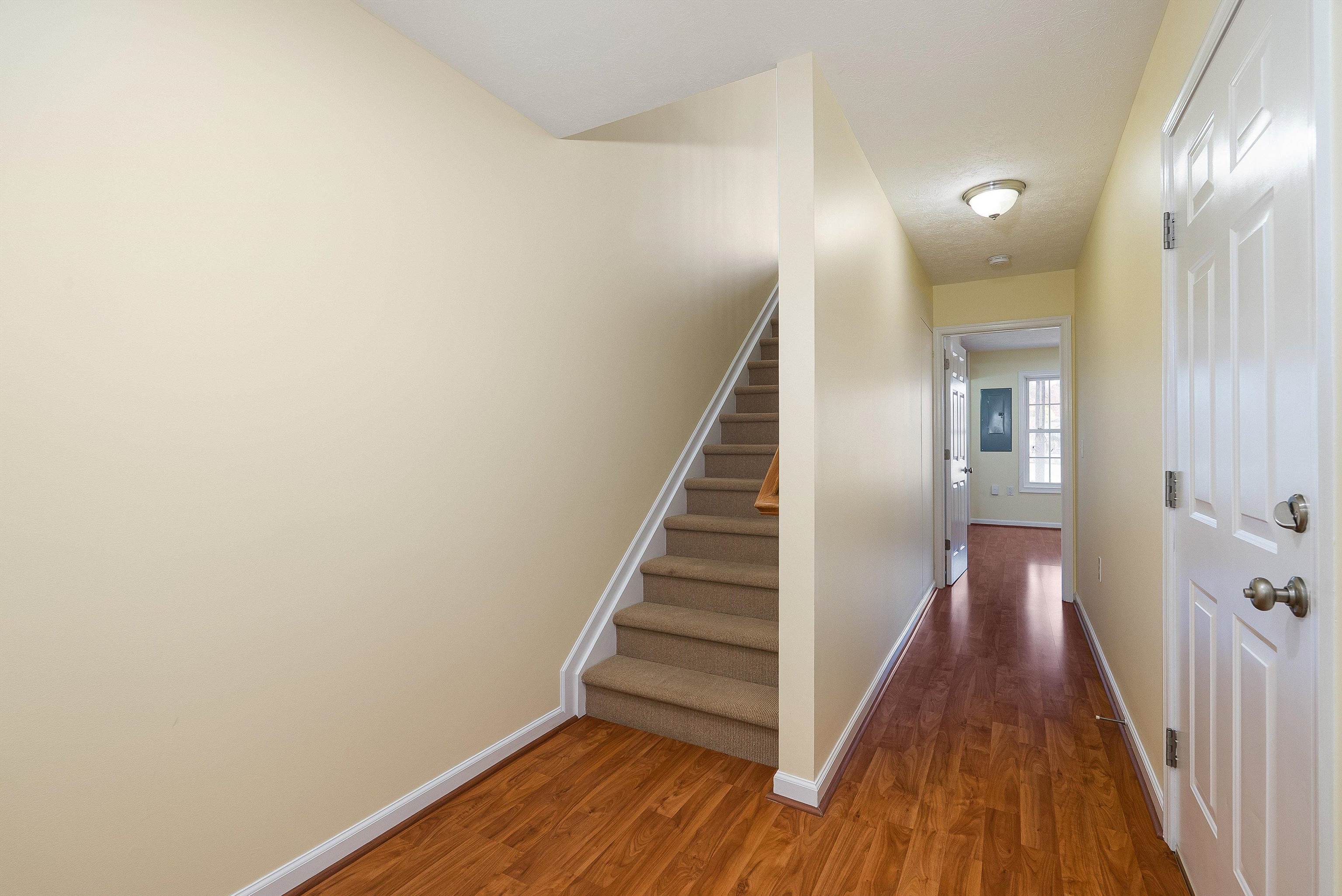 1439 Flowing Spring Lane Harrisonburg, VA 22801 - Photo 6 of 44 a view of a hallway with wooden floor and entryway