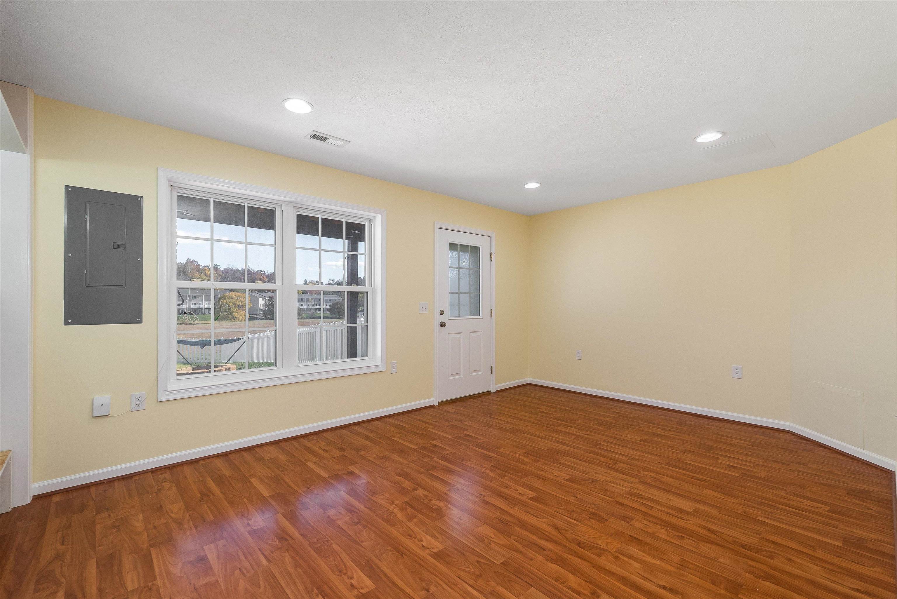1439 Flowing Spring Lane Harrisonburg, VA 22801 - Photo 7 of 44 a view of empty room with wooden floor and fan