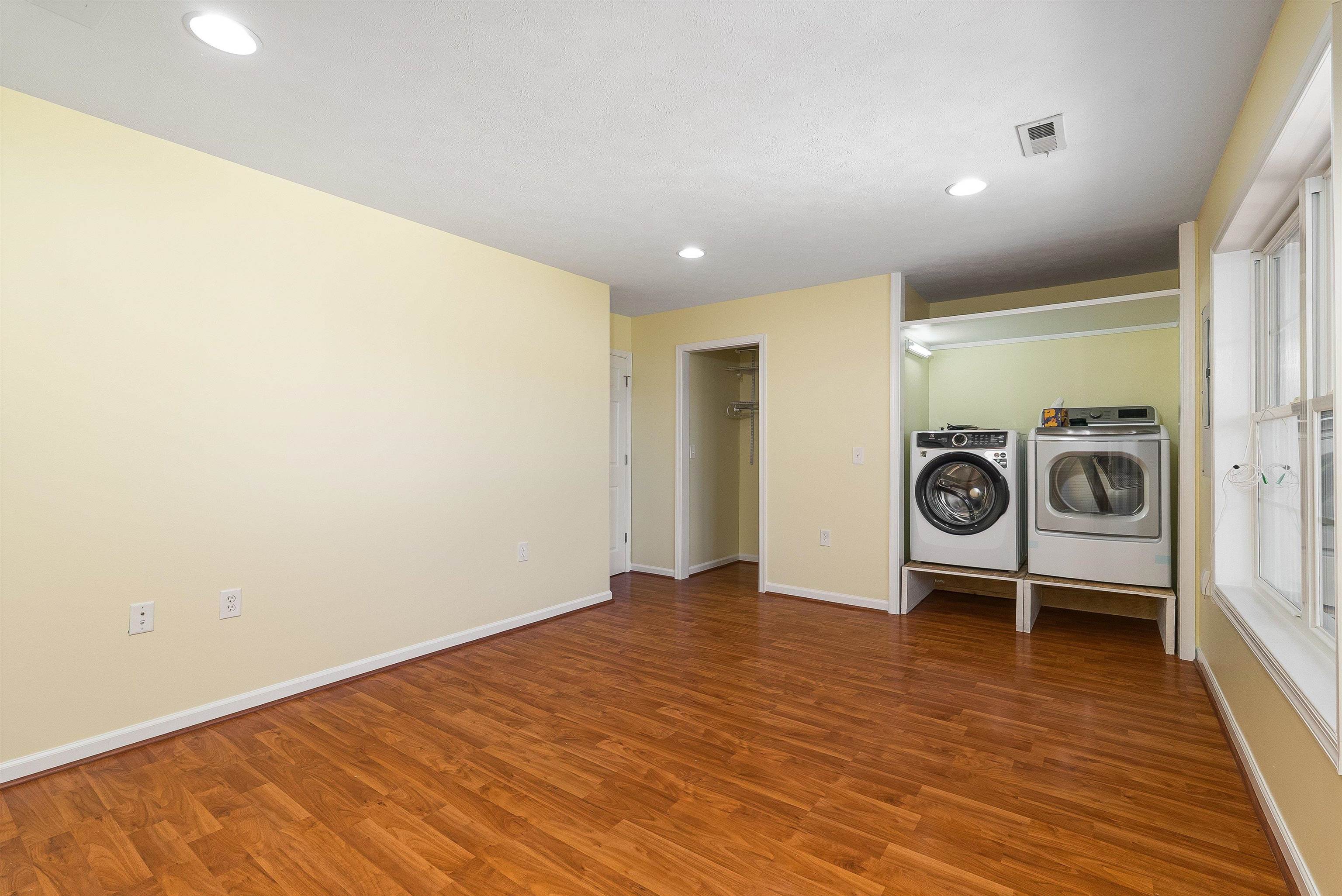 1439 Flowing Spring Lane Harrisonburg, VA 22801 - Photo 8 of 44 a view of a hallway with wooden floor