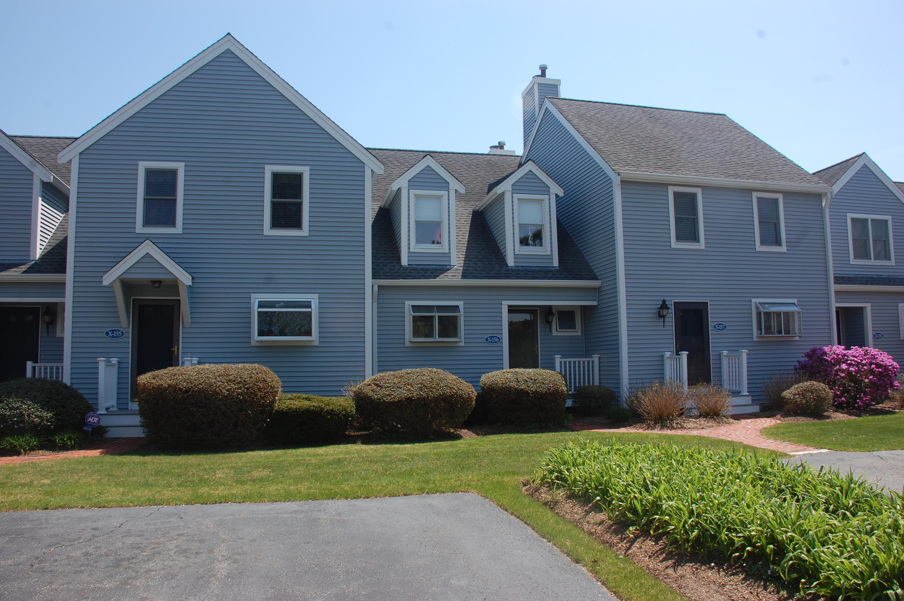 156 Shellback Way, Unit X156 Mashpee, MA 02649 - Photo 1 of 7 a house view with a garden space