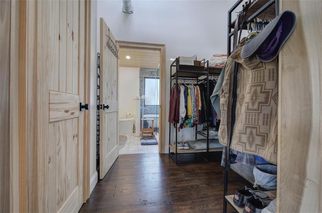 675 McGee Bend Road Southwest Cave Spring, GA 30124 - Photo 20 of 71 a view of walk in closet with clothes and shoes
