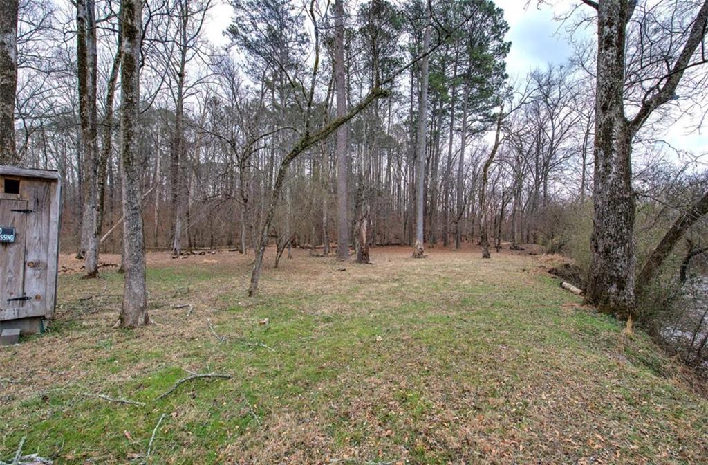 675 McGee Bend Road Southwest Cave Spring, GA 30124 - Photo 43 of 71 a backyard of a house with lots of green space