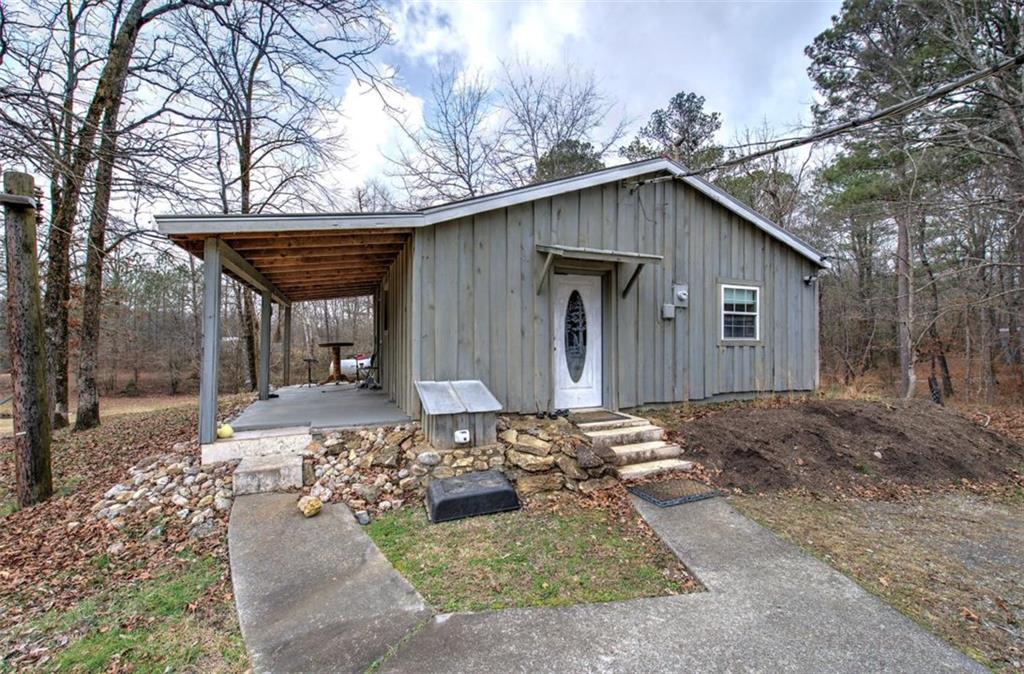 675 McGee Bend Road Southwest Cave Spring, GA 30124 - Photo 48 of 71 a view of a house with a yard