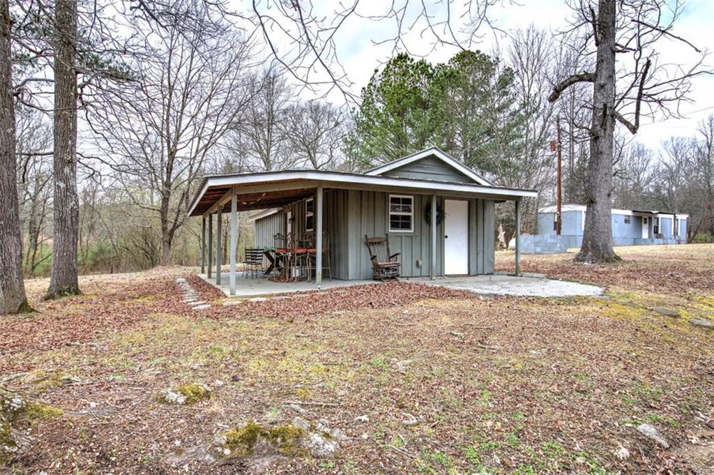 675 McGee Bend Road Southwest Cave Spring, GA 30124 - Photo 52 of 71 a view of a house with a yard and large tree
