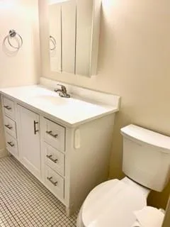 a bathroom with a sink a washer and dryer