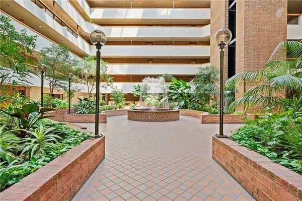 a view of balcony with a potted plant