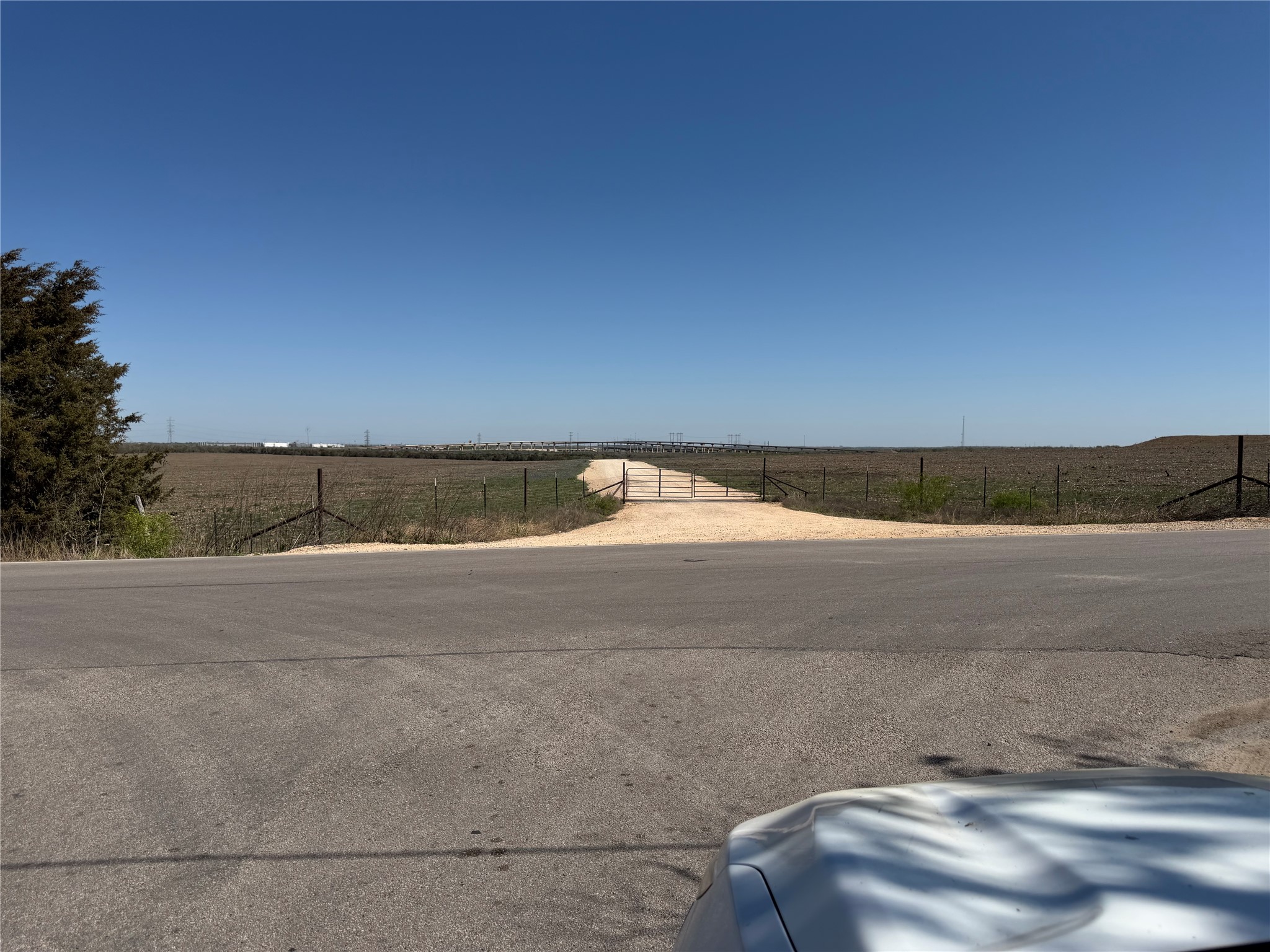 12129 Glass Road, Unit 3 Buda, TX 78610 - Photo 8 of 9 a view of an outdoor space and mountain view