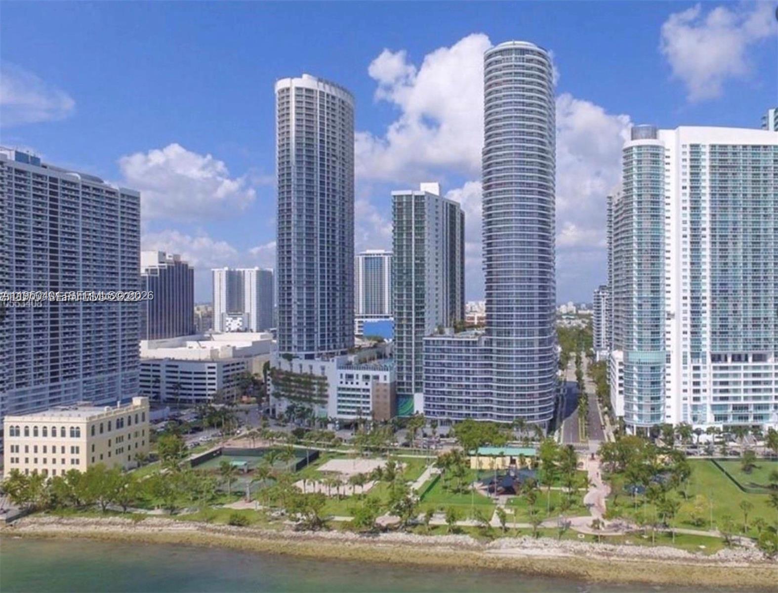 a view of a city with tall buildings