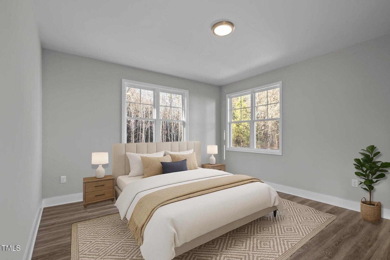 1101 Ridge Road Roxboro, NC 27573 - Photo 18 of 44 a bedroom with a bed and a window