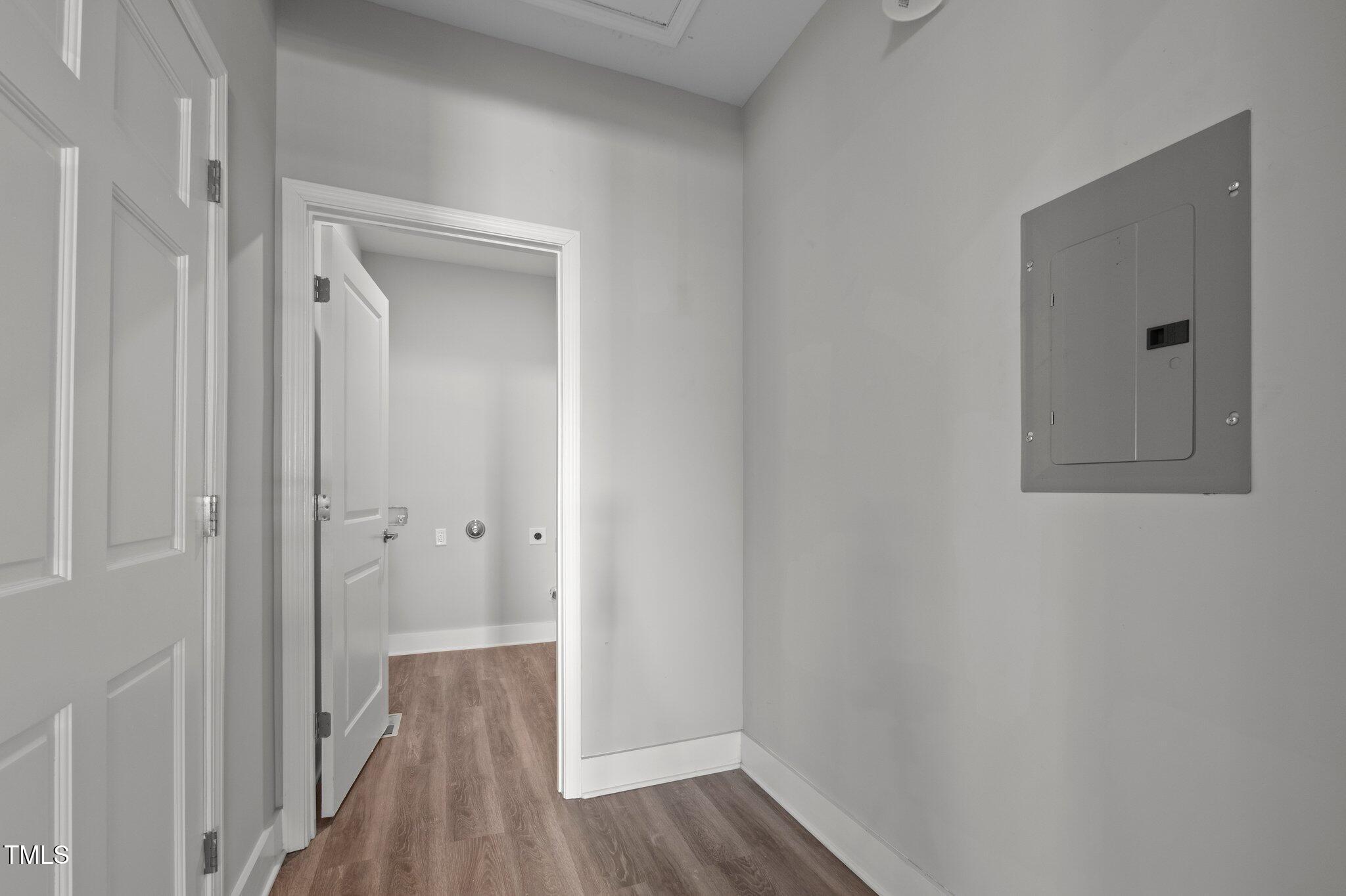 1101 Ridge Road Roxboro, NC 27573 - Photo 28 of 44 a view of a hallway with wooden floor