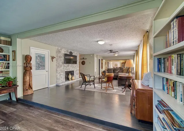 a view of a living room and dining room