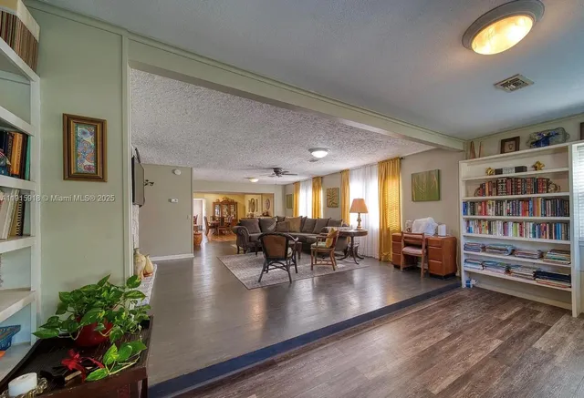 a view of a living room and dining room