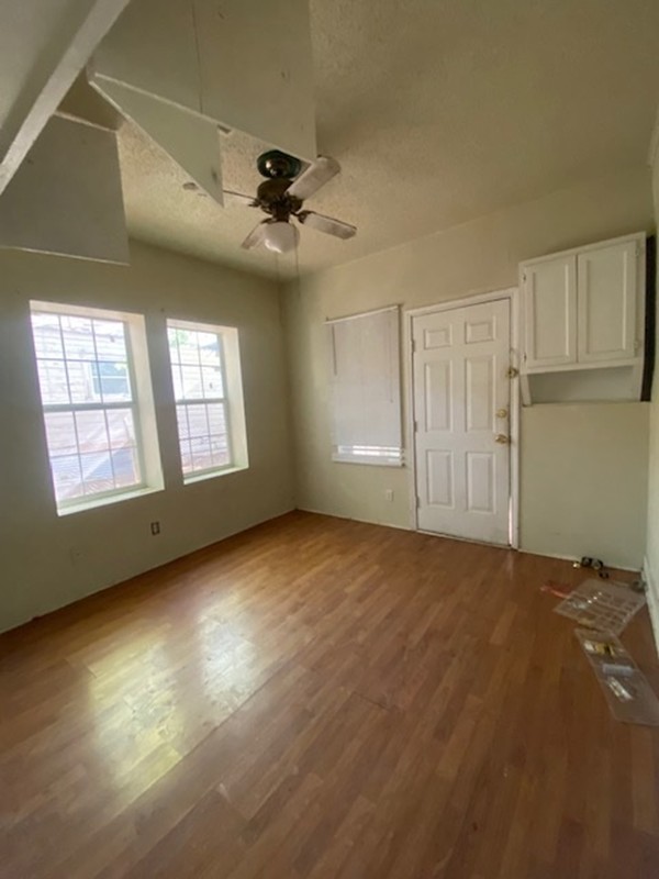 523 South Rio Grande Street Lockhart, TX 78644 - Photo 9 of 16 a view of an empty room with a window