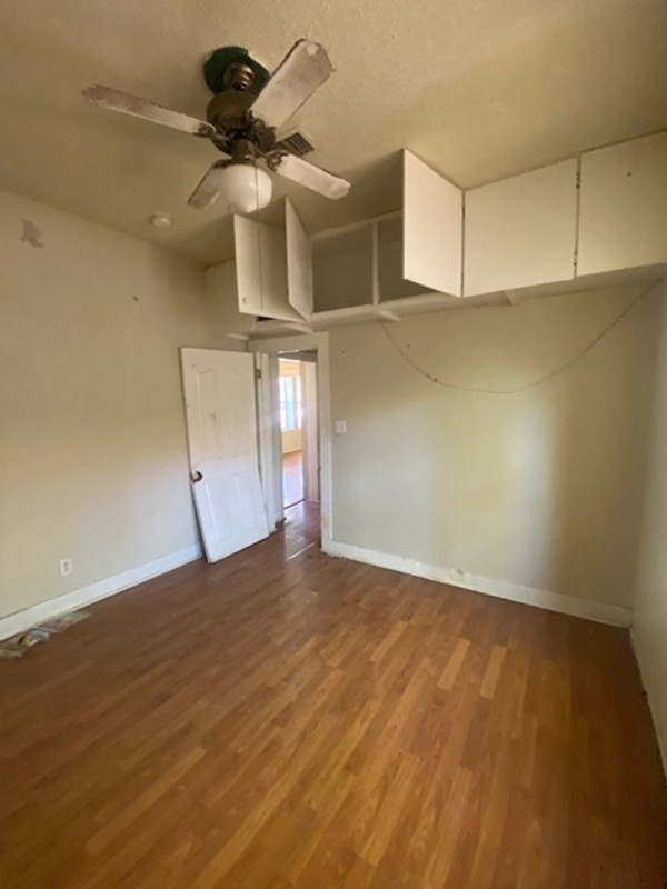 523 South Rio Grande Street Lockhart, TX 78644 - Photo 10 of 16 a view of an empty room with a window