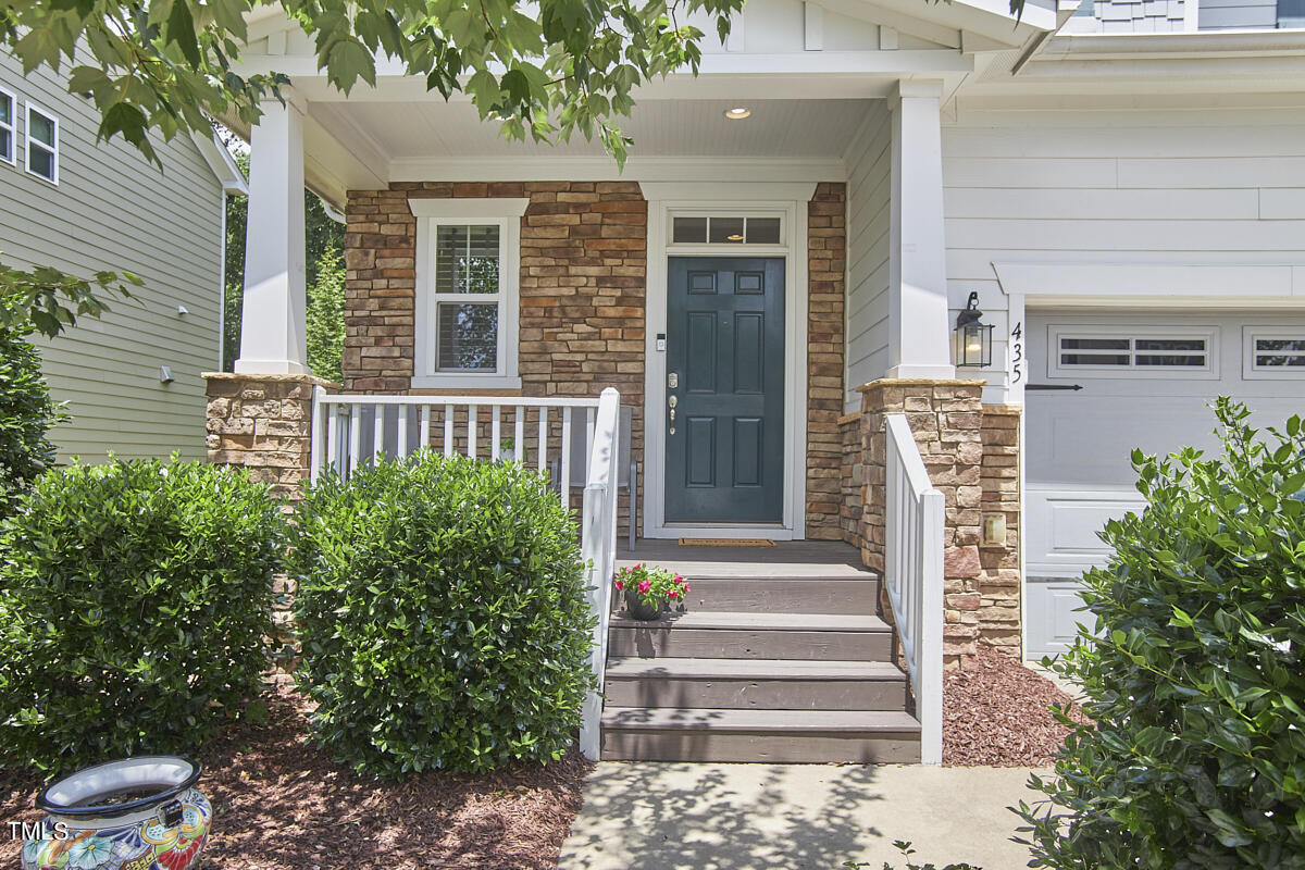 435 Plainview Avenue Raleigh, NC 27604 - Photo 3 of 35 a front view of a house with plants