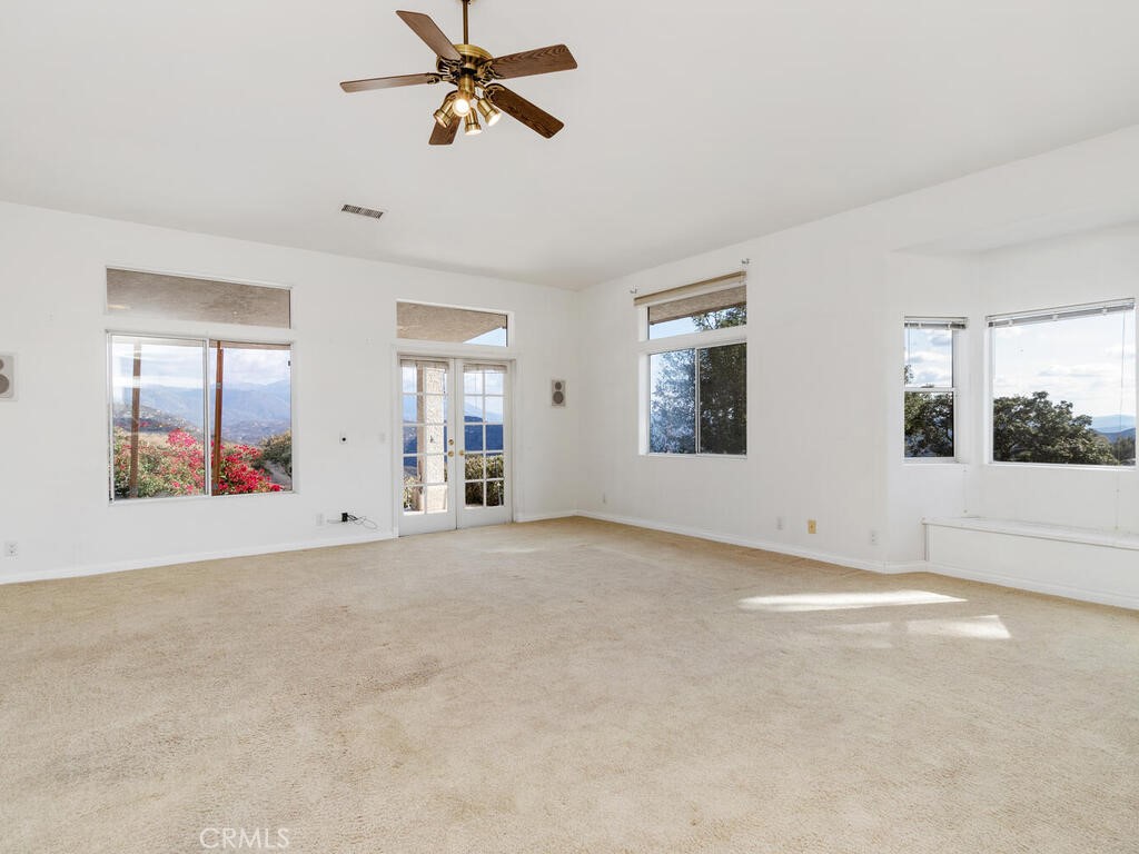 6455 Rainbow Heights Road Fallbrook, CA 92028 - Photo 26 of 63 a view of an empty room with a window