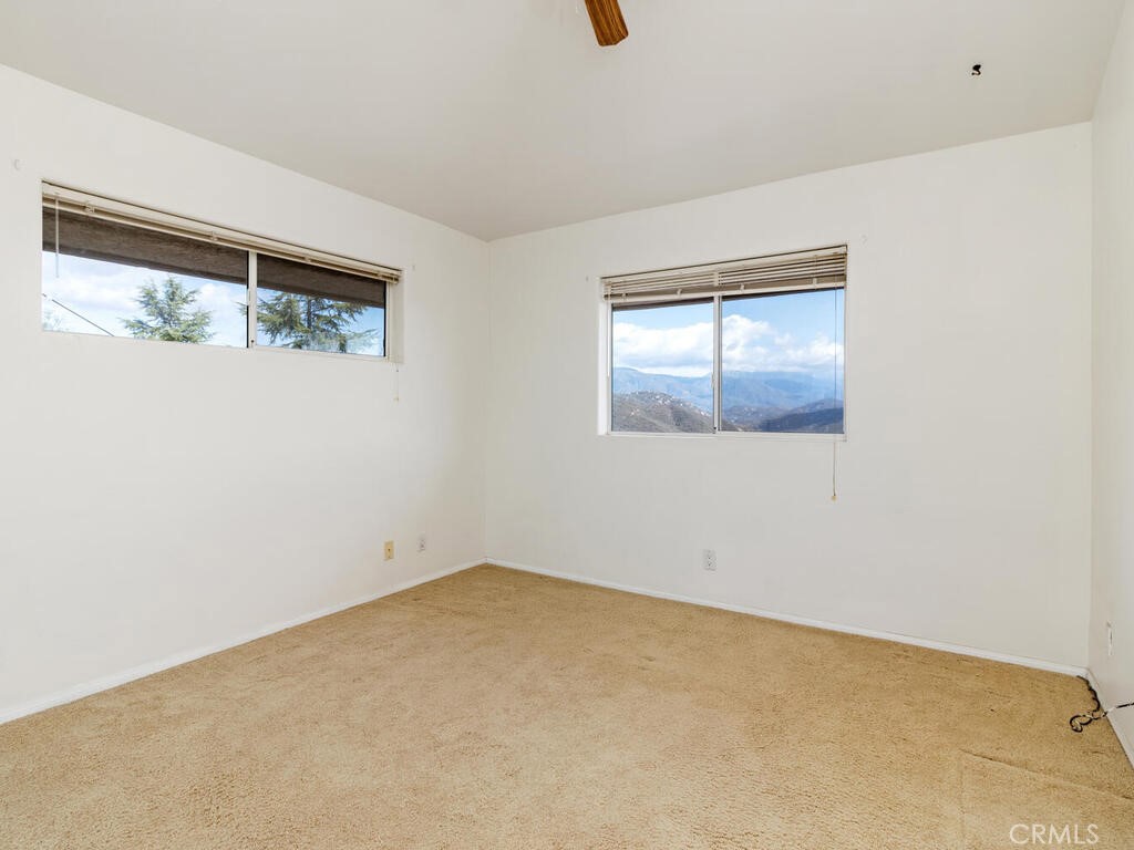 6455 Rainbow Heights Road Fallbrook, CA 92028 - Photo 38 of 63 an empty room with a window