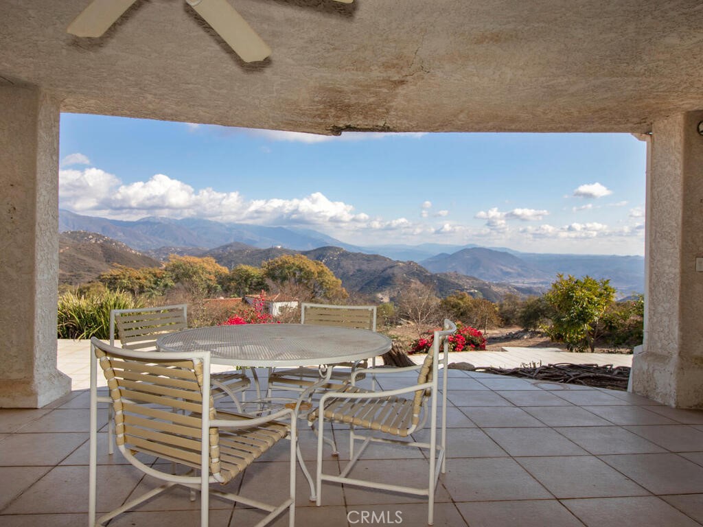 6455 Rainbow Heights Road Fallbrook, CA 92028 - Photo 40 of 63 a view of a terrace with furniture and city view