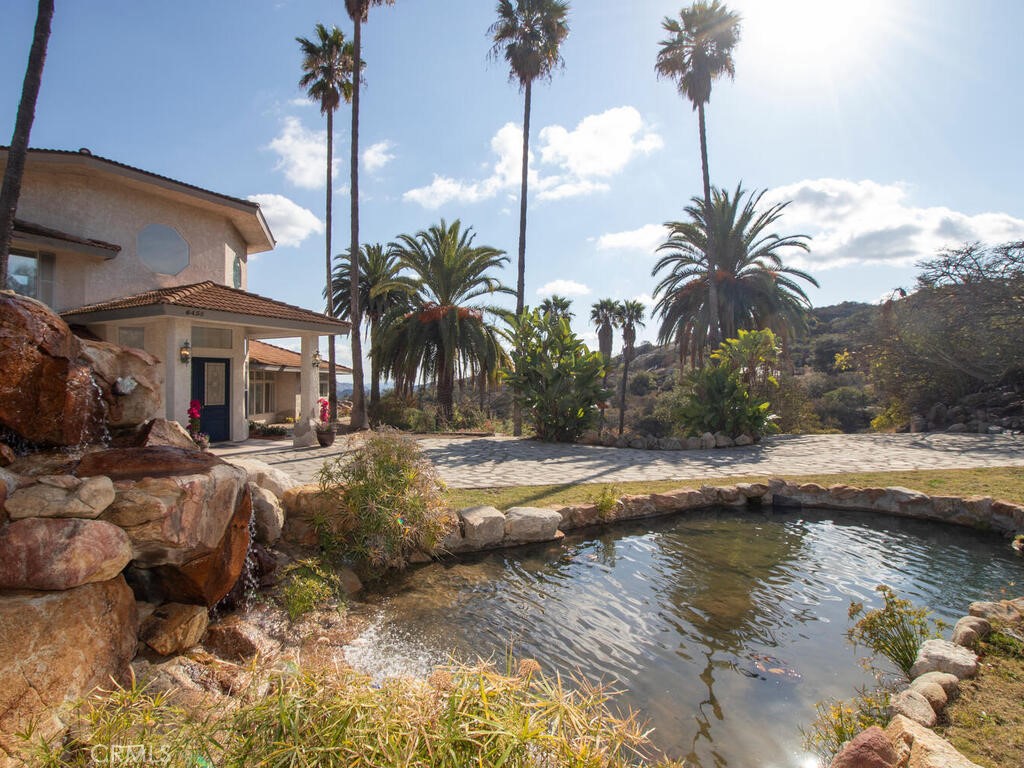 6455 Rainbow Heights Road Fallbrook, CA 92028 - Photo 7 of 63 a view of swimming pool with a table and chairs