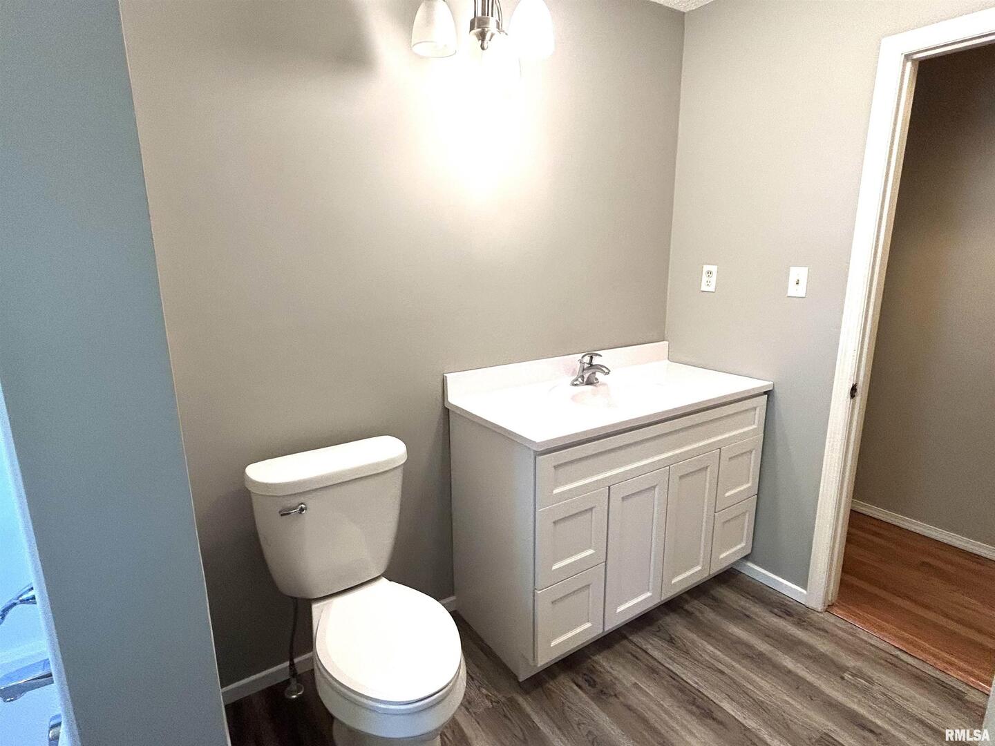 744 Cardinal Road Carbondale, IL 62901 - Photo 21 of 38 a bathroom with a toilet sink and mirror