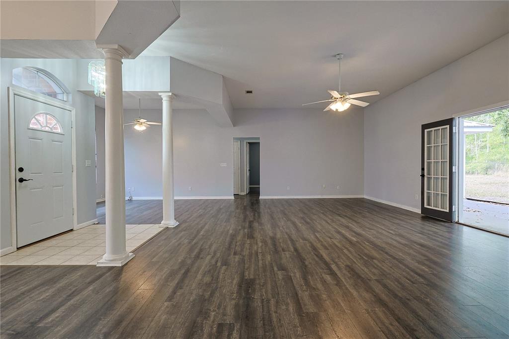166 Southwest Hancock Court Lake City, FL 32024 - Photo 13 of 46 a view of empty room with wooden floor