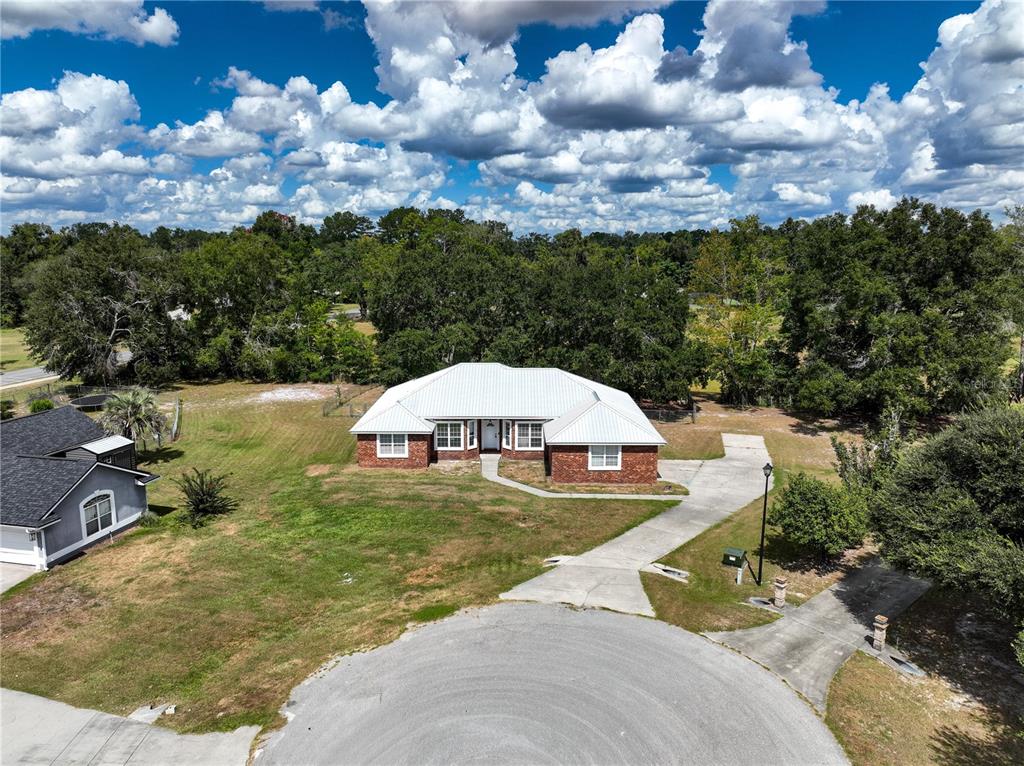 166 Southwest Hancock Court Lake City, FL 32024 - Photo 2 of 46 a view of a garden with a slide