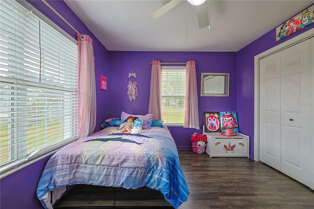 166 Southwest Hancock Court Lake City, FL 32024 - Photo 23 of 37 a bedroom with a bed and a window