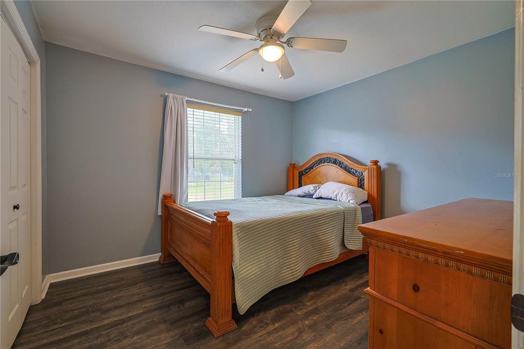 166 Southwest Hancock Court Lake City, FL 32024 - Photo 25 of 37 a bedroom with a bed and window