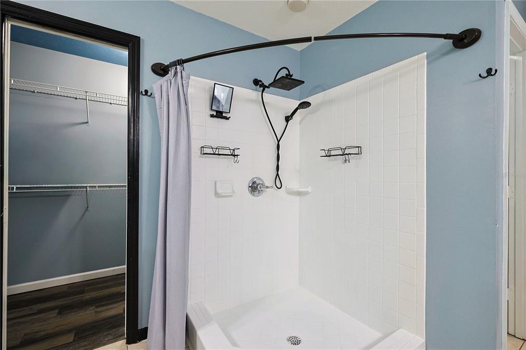 166 Southwest Hancock Court Lake City, FL 32024 - Photo 26 of 46 a bathroom with a glass shower door