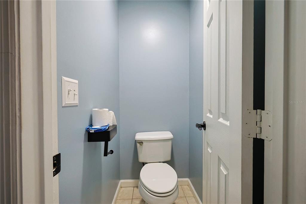 166 Southwest Hancock Court Lake City, FL 32024 - Photo 27 of 46 a white toilet sitting next to a bathroom sink