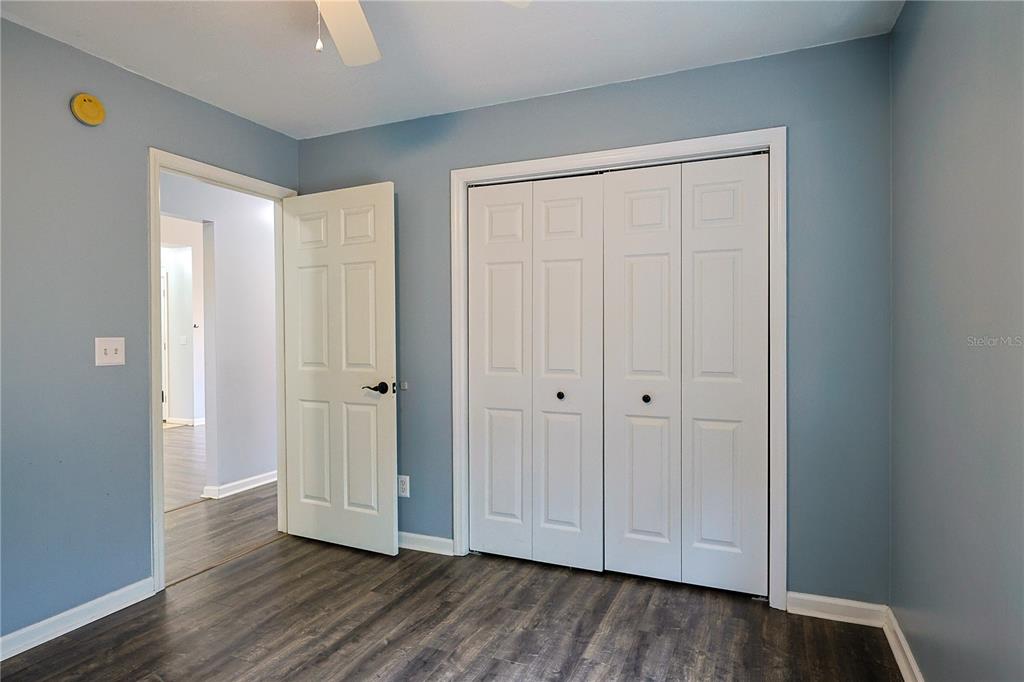 166 Southwest Hancock Court Lake City, FL 32024 - Photo 30 of 46 a view of empty room with wooden floor and entryway