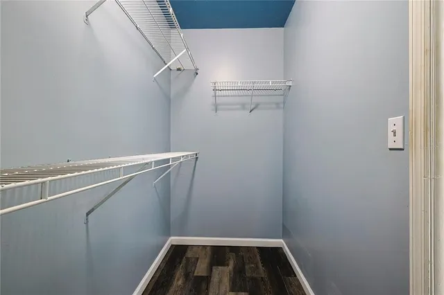 a view of a room with racks on the wall