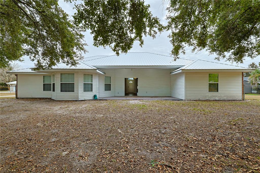 166 Southwest Hancock Court Lake City, FL 32024 - Photo 46 of 46 front view of a house with a yard