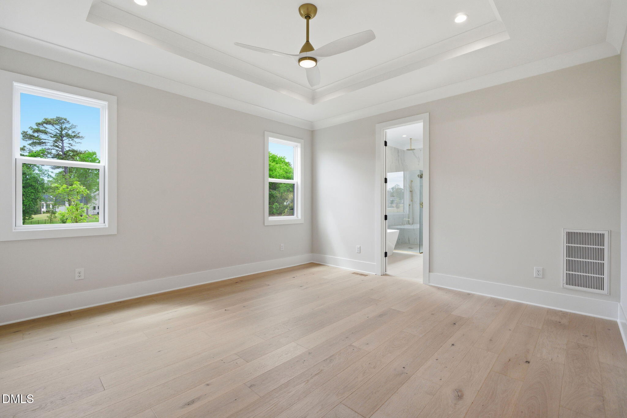 1304 Sanctuary Pond Drive Raleigh, NC 27606 - Photo 17 of 52 a view of an empty room with a window