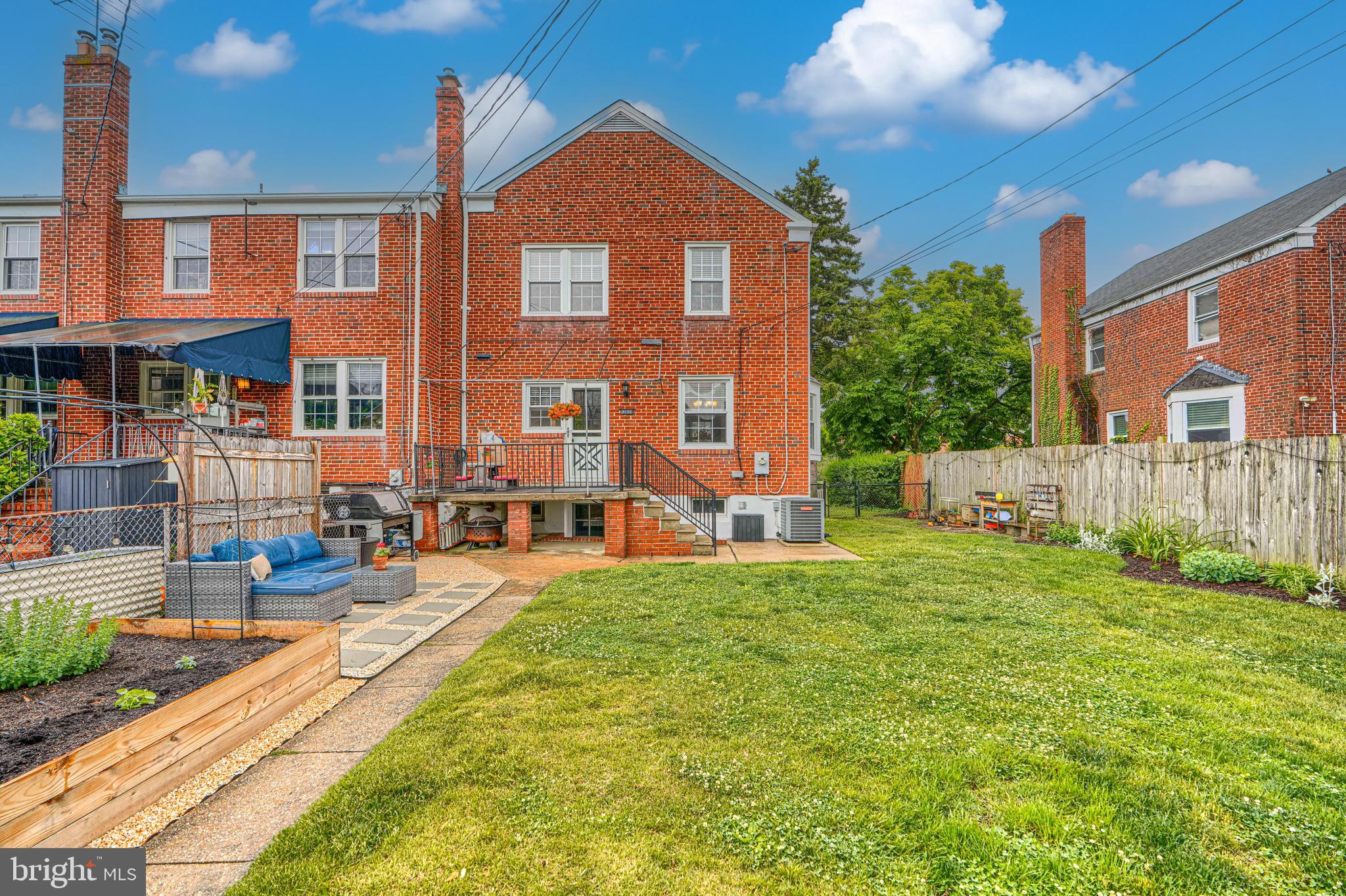 8132 Pleasant Plains Road Towson, MD 21286 - Photo 51 of 55 a front view of a house with a yard