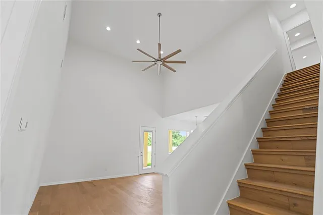 a kitchen with kitchen island a sink stainless steel appliances and cabinets