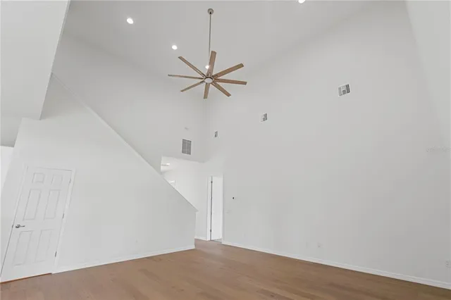 a kitchen with stainless steel appliances a stove microwave and refrigerator