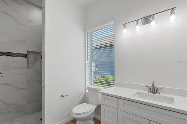 a kitchen with stainless steel appliances a refrigerator stove and sink