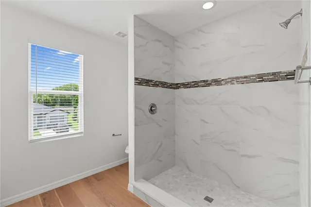 an aerial view of a house with a garden