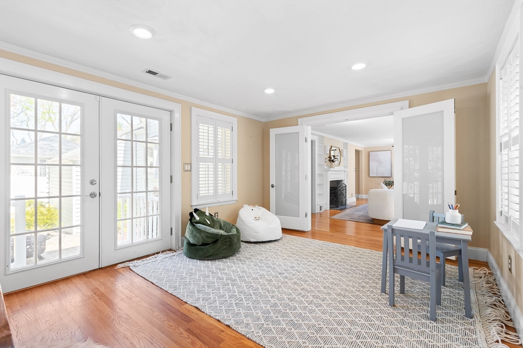 587 Greendale Avenue Needham, MA 02492 - Photo 14 of 36 a living room with furniture and wooden floor