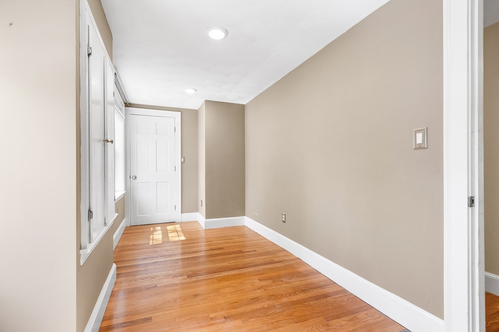 587 Greendale Avenue Needham, MA 02492 - Photo 25 of 36 a view of an empty room