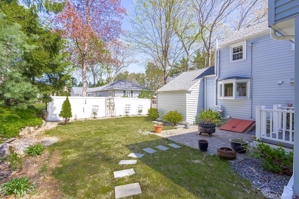 587 Greendale Avenue Needham, MA 02492 - Photo 30 of 36 a house view with a garden space