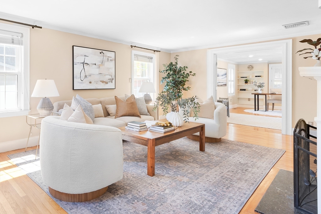 587 Greendale Avenue Needham, MA 02492 - Photo 9 of 36 a living room with furniture and a wooden floor